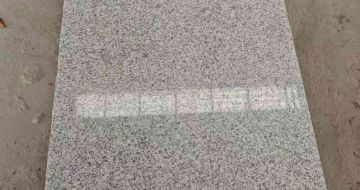 辽阳芝麻白光面毛板